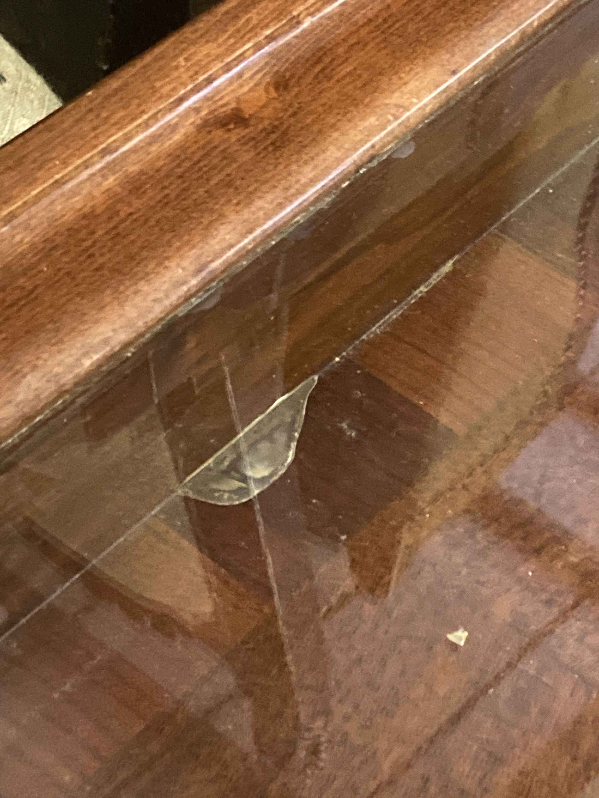 A reproduction walnut glass top square coffee table, 103cm, height 46cm